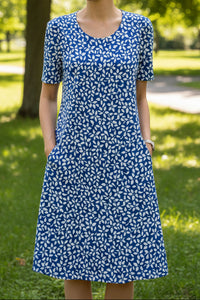 Knee-Length Dress with Flattering Fit and Hidden Pockets 11