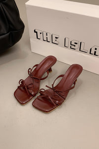 Elegant Thin Heel Sandals with Feminine Bow Accent