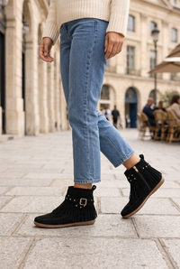 Black fringed ankle boots styled for a realistic city walk