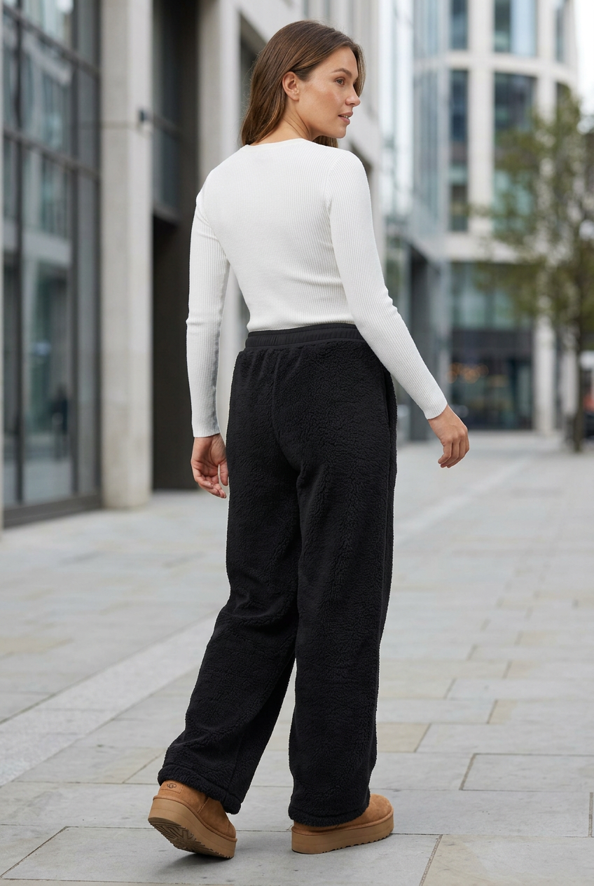 Black trousers, rear view