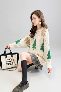 Cream jumper seated studio view
