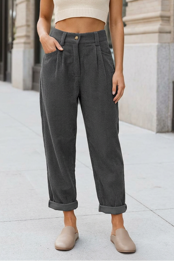 Gray trousers on a sidewalk