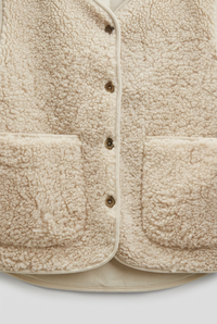 Isla fleece vest pocket detail