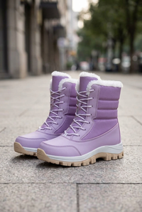 Lavender boot pair on a sidewalk