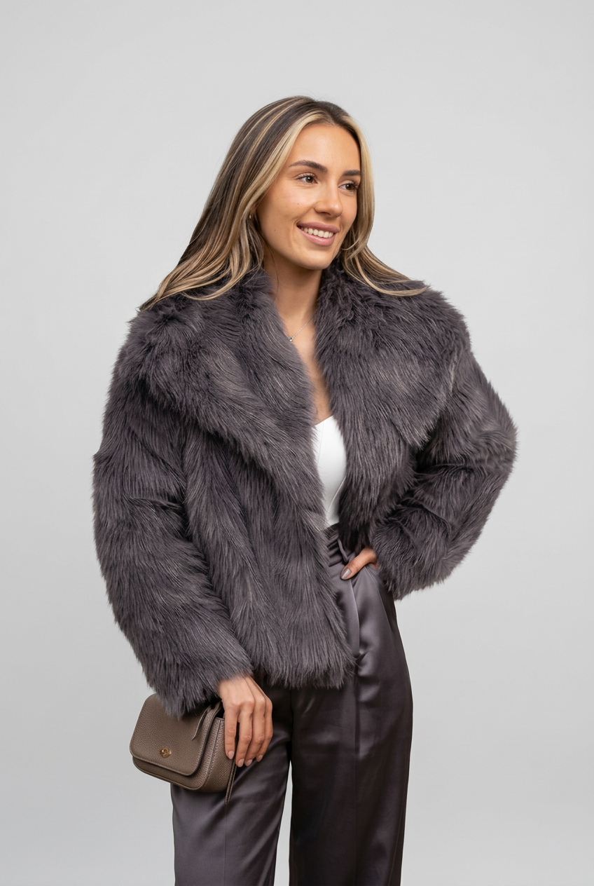 Norah charcoal jacket hand-on-hip studio preview