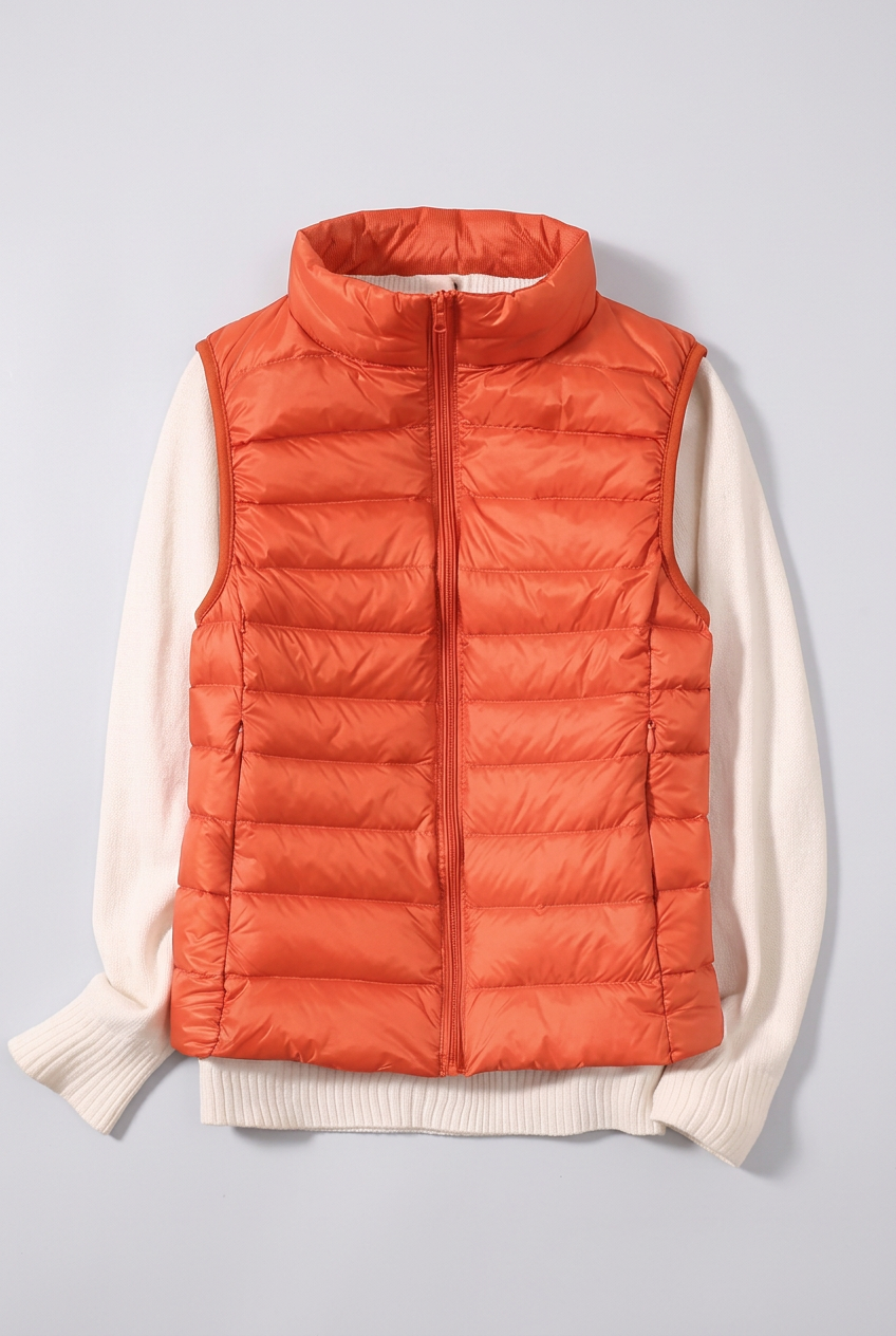 Orange Phoebe gilet studio preview