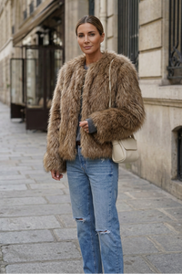 Sidewalk portrait wearing the faux-fur coat