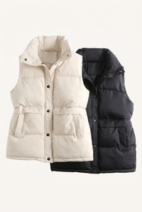 White and black Etta vests without labels or hangers